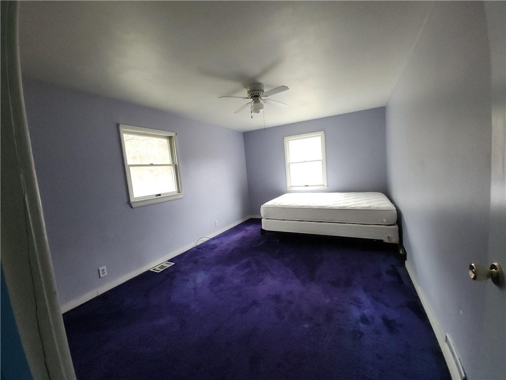 31 Wheatley Road Charleroi, PA 15022 - Photo 18 of 48 a bedroom with a bed and window