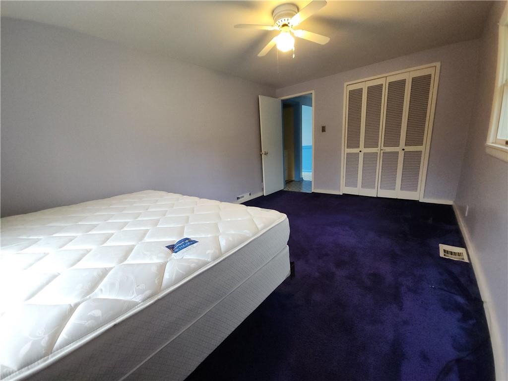 31 Wheatley Road Charleroi, PA 15022 - Photo 20 of 48 a bed sitting in a bedroom next to a window