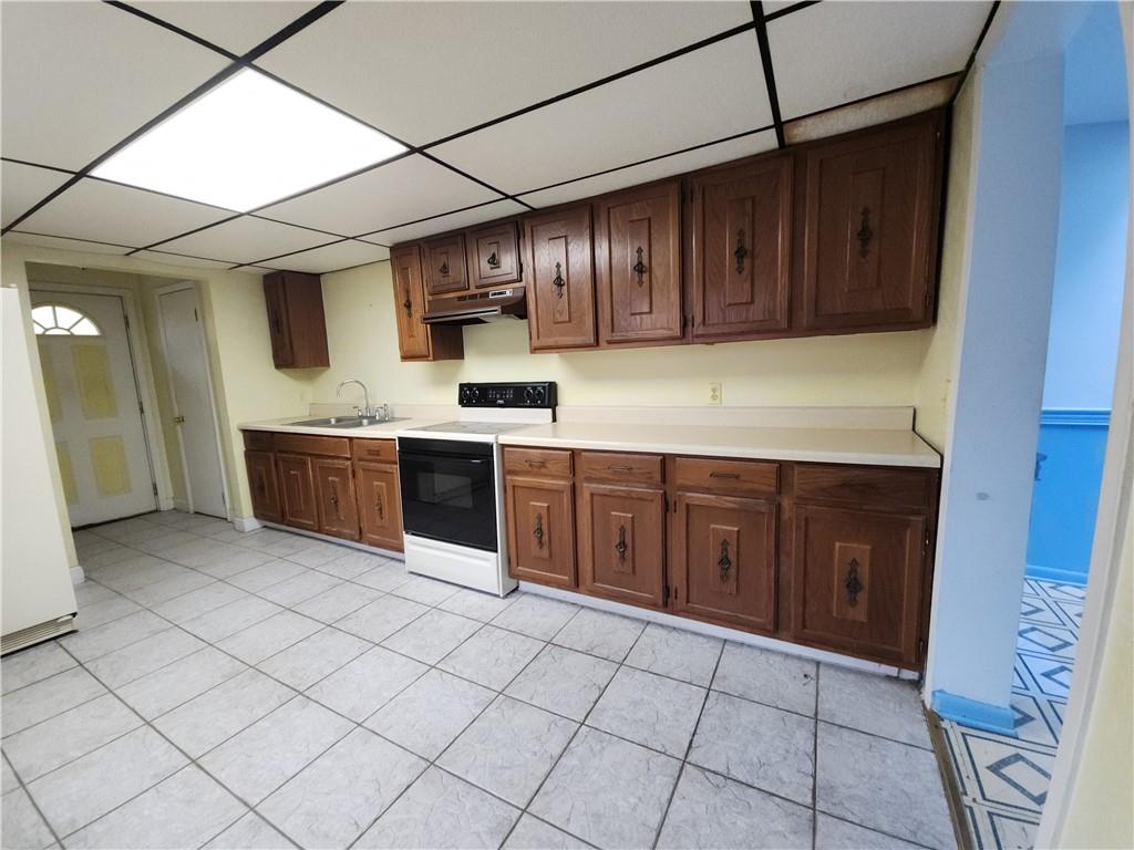 31 Wheatley Road Charleroi, PA 15022 - Photo 9 of 48 a kitchen with stainless steel appliances granite countertop a sink and cabinets
