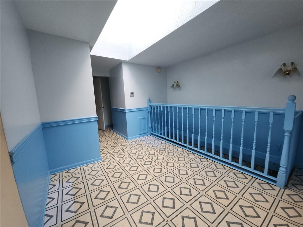 31 Wheatley Road Charleroi, PA 15022 - Photo 10 of 48 wooden floor in a hall with wooden cabinet