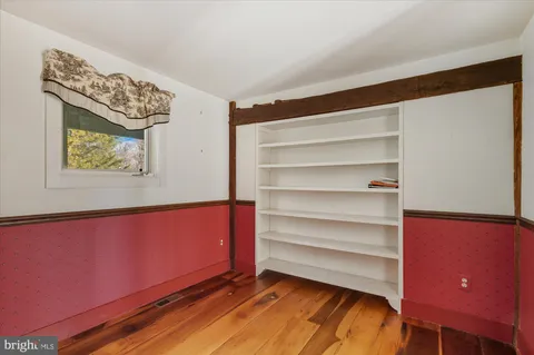 a kitchen that has a sink and a stove