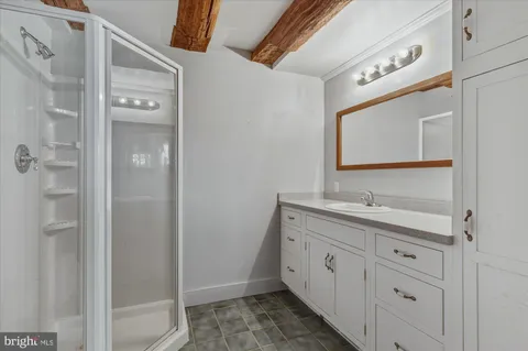 a view of an empty room with a garage