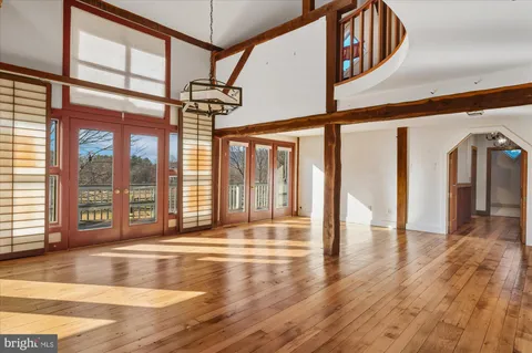 a view of entryway with wooden floor