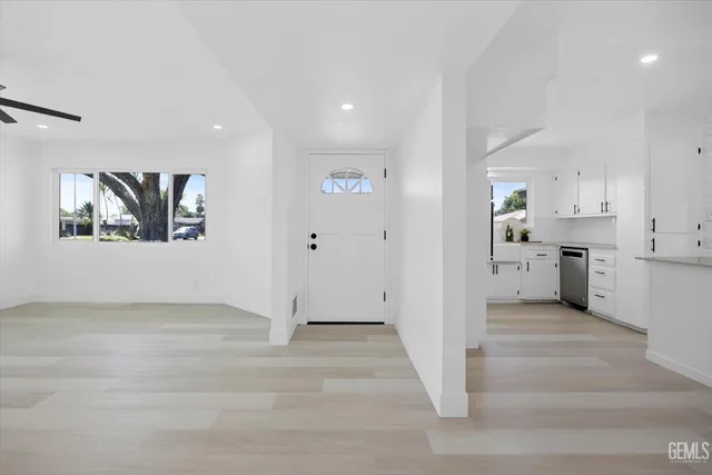 a view of a kitchen with a sink