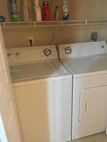 a bathroom with a shower and a toilet