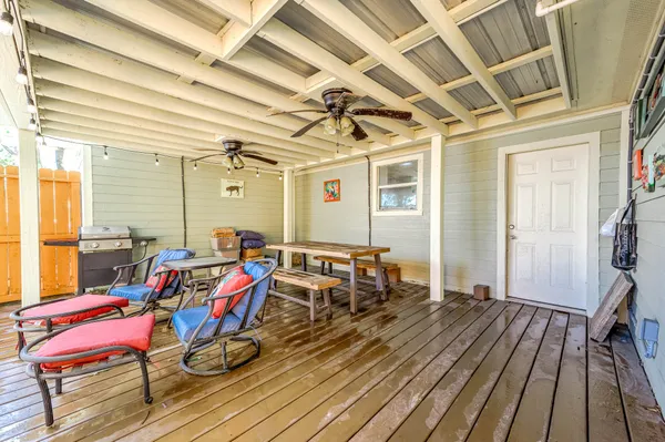 a view of porch with seating area