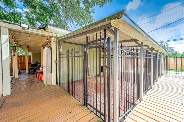 a view of a house with a yard and garage