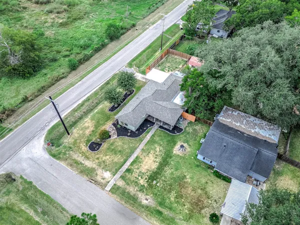 a house with garden in front of it