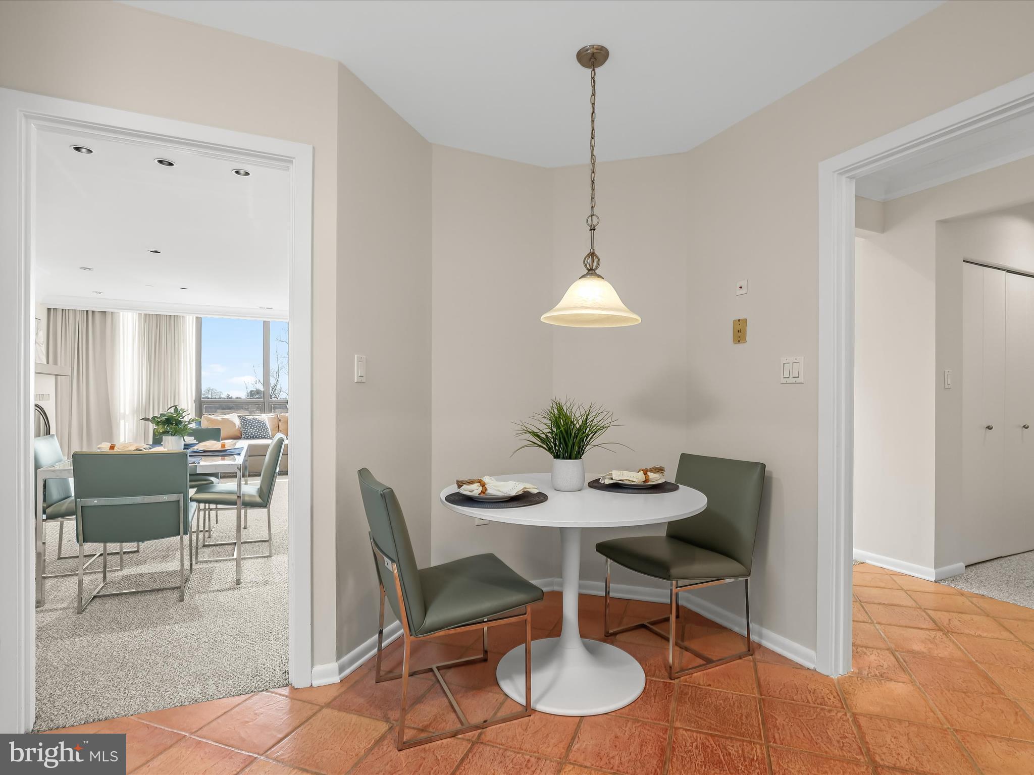 4001 Old Court Road, Unit 519 Pikesville, MD 21208 - Photo 15 of 43 a view of a dining room with furniture