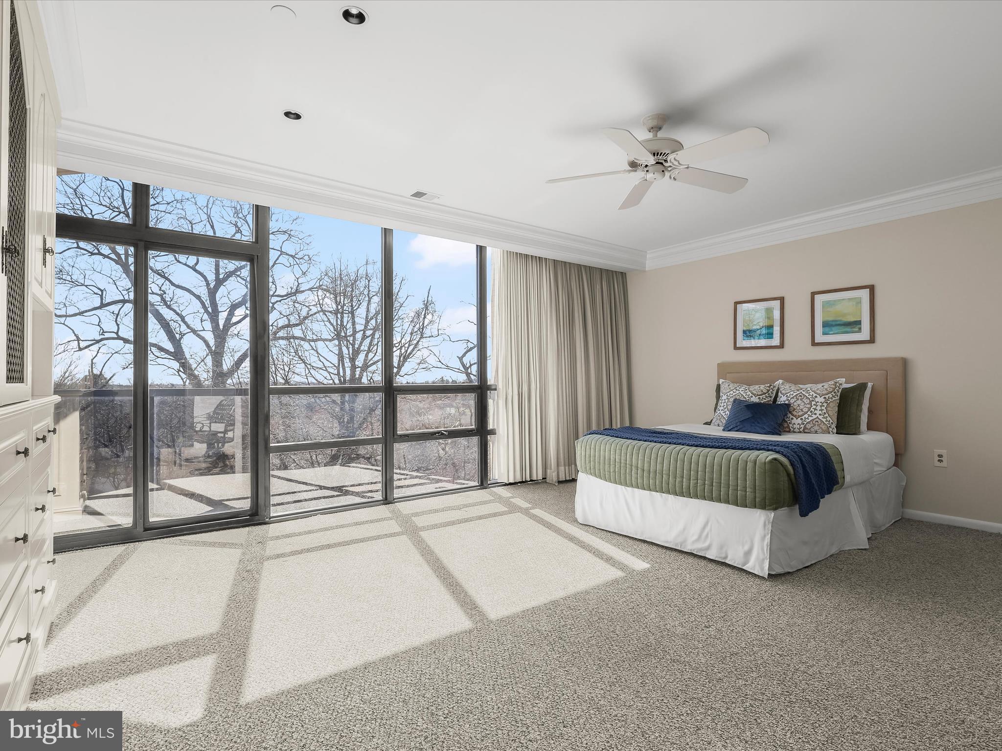 4001 Old Court Road, Unit 519 Pikesville, MD 21208 - Photo 23 of 43 a spacious bedroom with a bed and large window