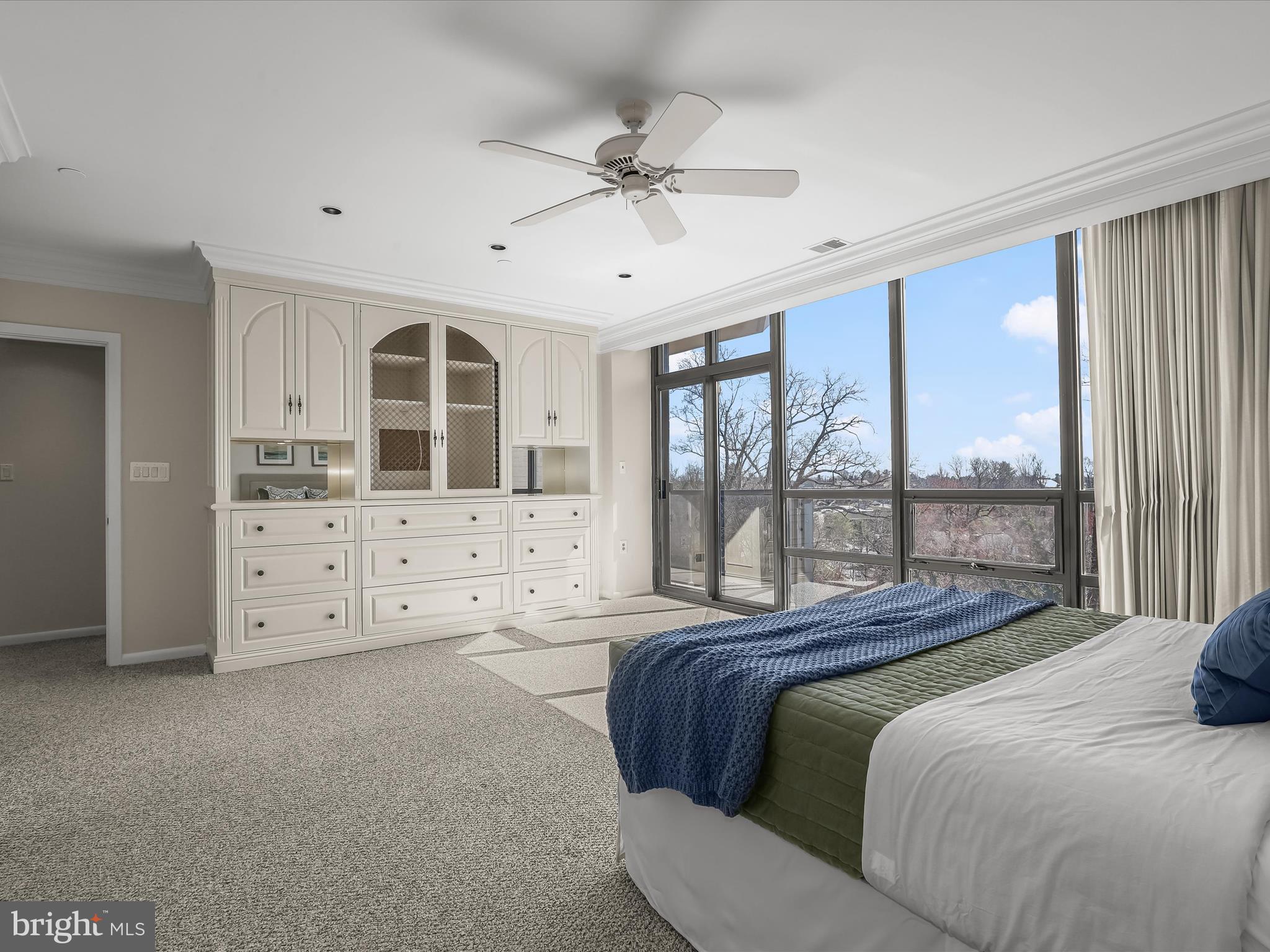 4001 Old Court Road, Unit 519 Pikesville, MD 21208 - Photo 24 of 43 a bedroom with a large bed and a large window