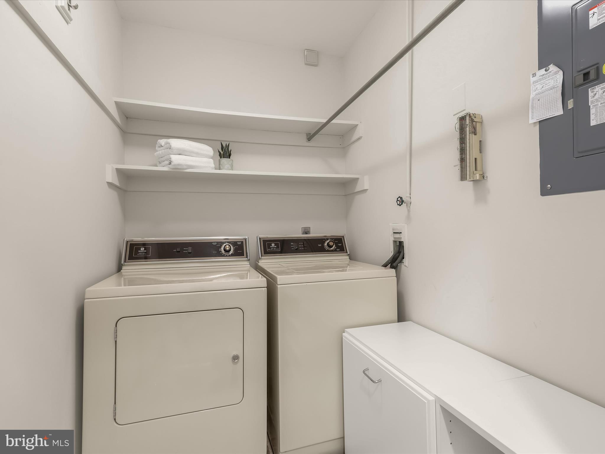 4001 Old Court Road, Unit 519 Pikesville, MD 21208 - Photo 31 of 43 a utility room with dryer and washer