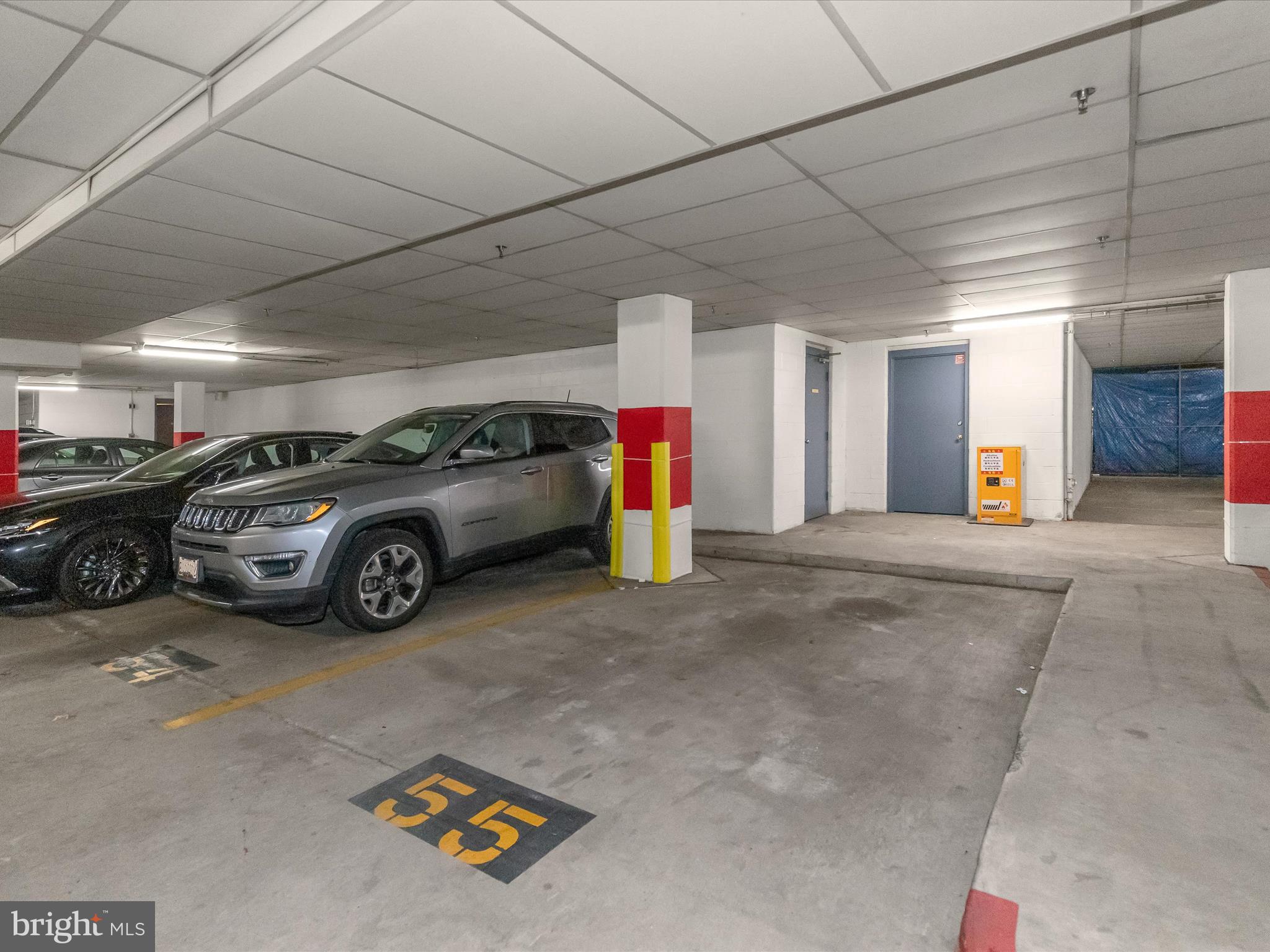 4001 Old Court Road, Unit 519 Pikesville, MD 21208 - Photo 33 of 43 a view of parking garage with cars parked