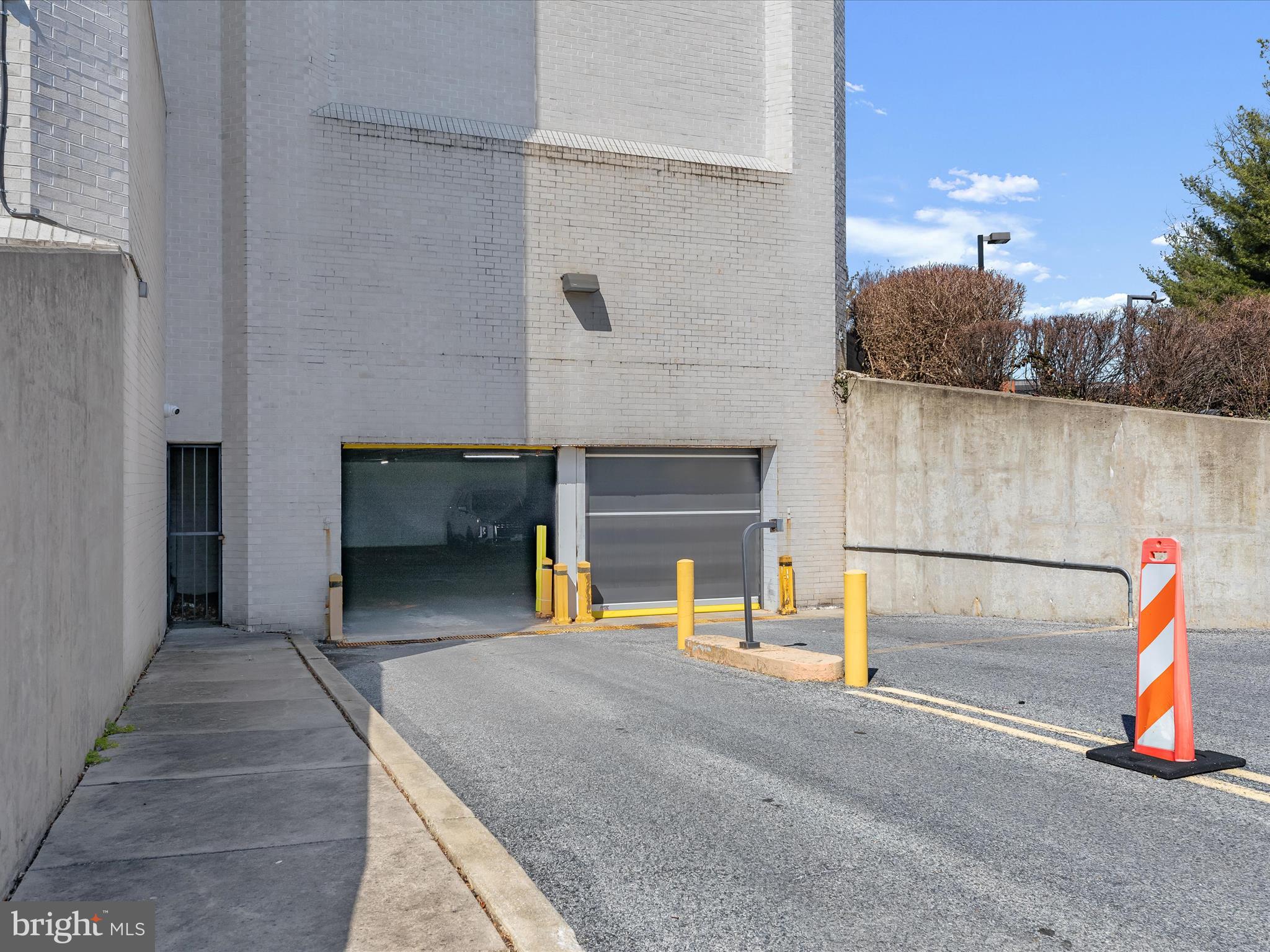 4001 Old Court Road, Unit 519 Pikesville, MD 21208 - Photo 35 of 43 a view of a house with backyard and a garage