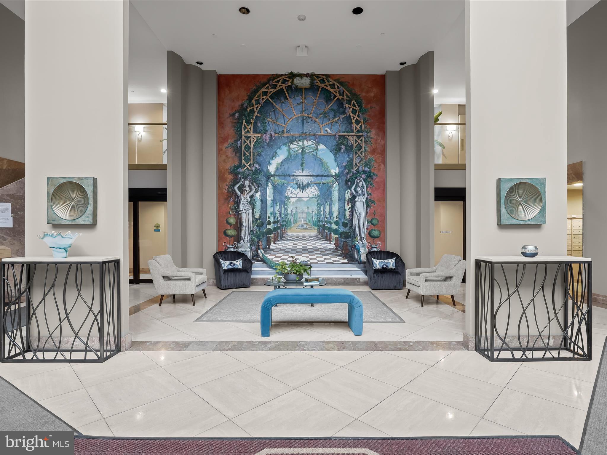 4001 Old Court Road, Unit 519 Pikesville, MD 21208 - Photo 36 of 43 a living room with furniture and a clock