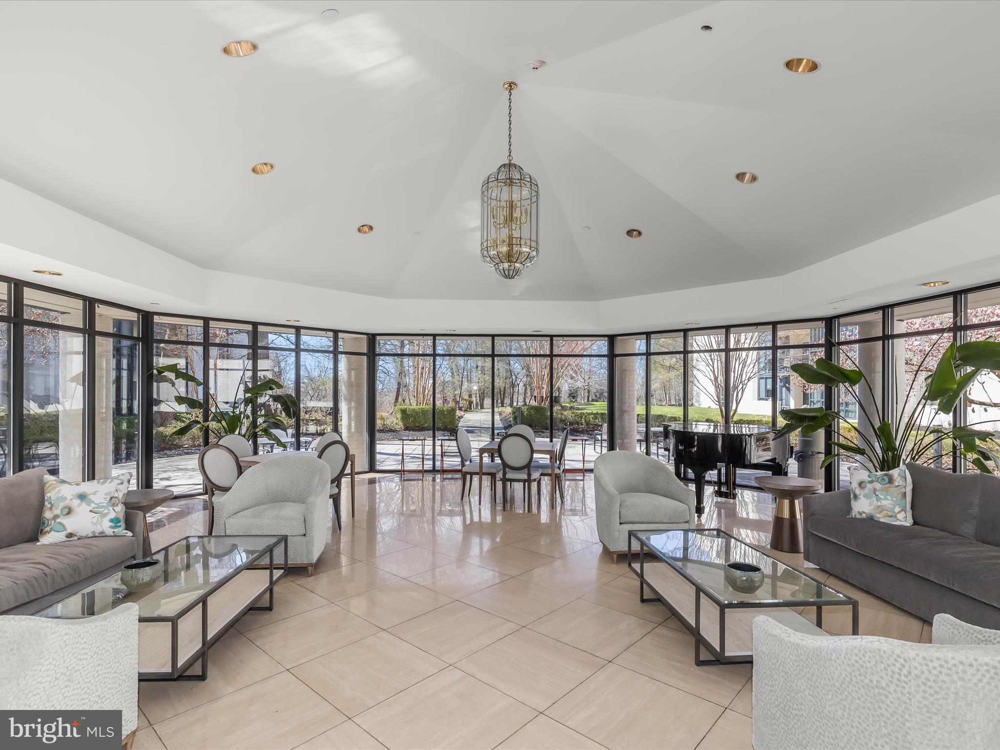 4001 Old Court Road, Unit 519 Pikesville, MD 21208 - Photo 38 of 43 a living room with furniture and floor to ceiling window
