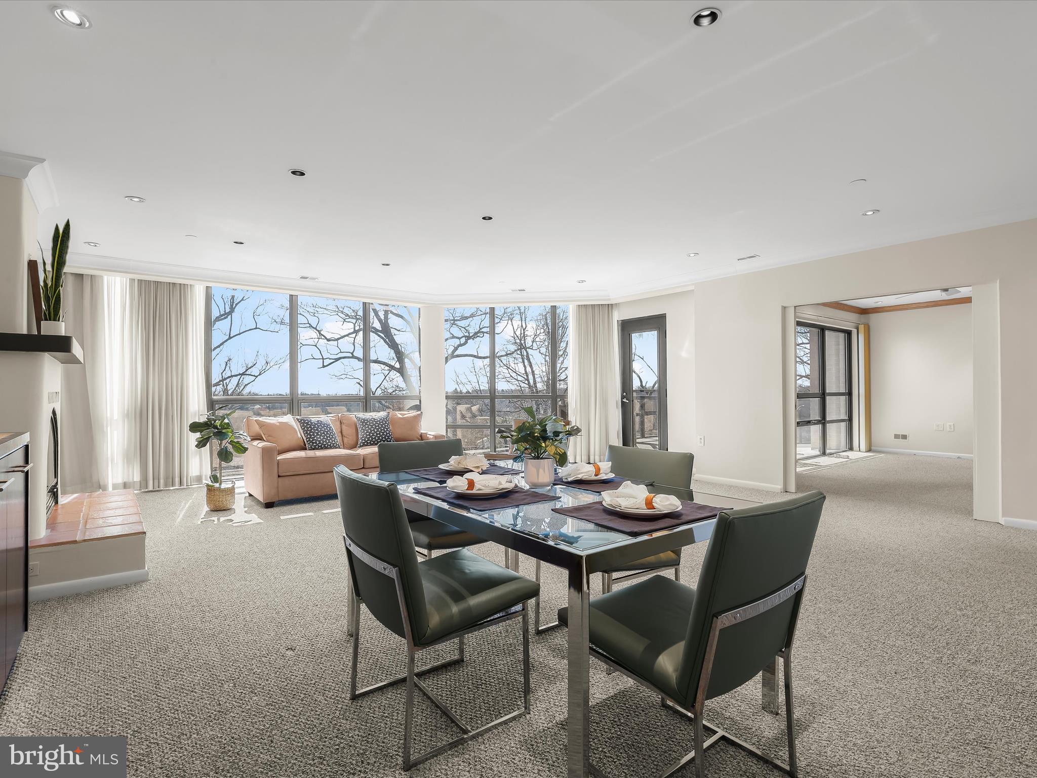 4001 Old Court Road, Unit 519 Pikesville, MD 21208 - Photo 7 of 43 a living room with furniture and a large window