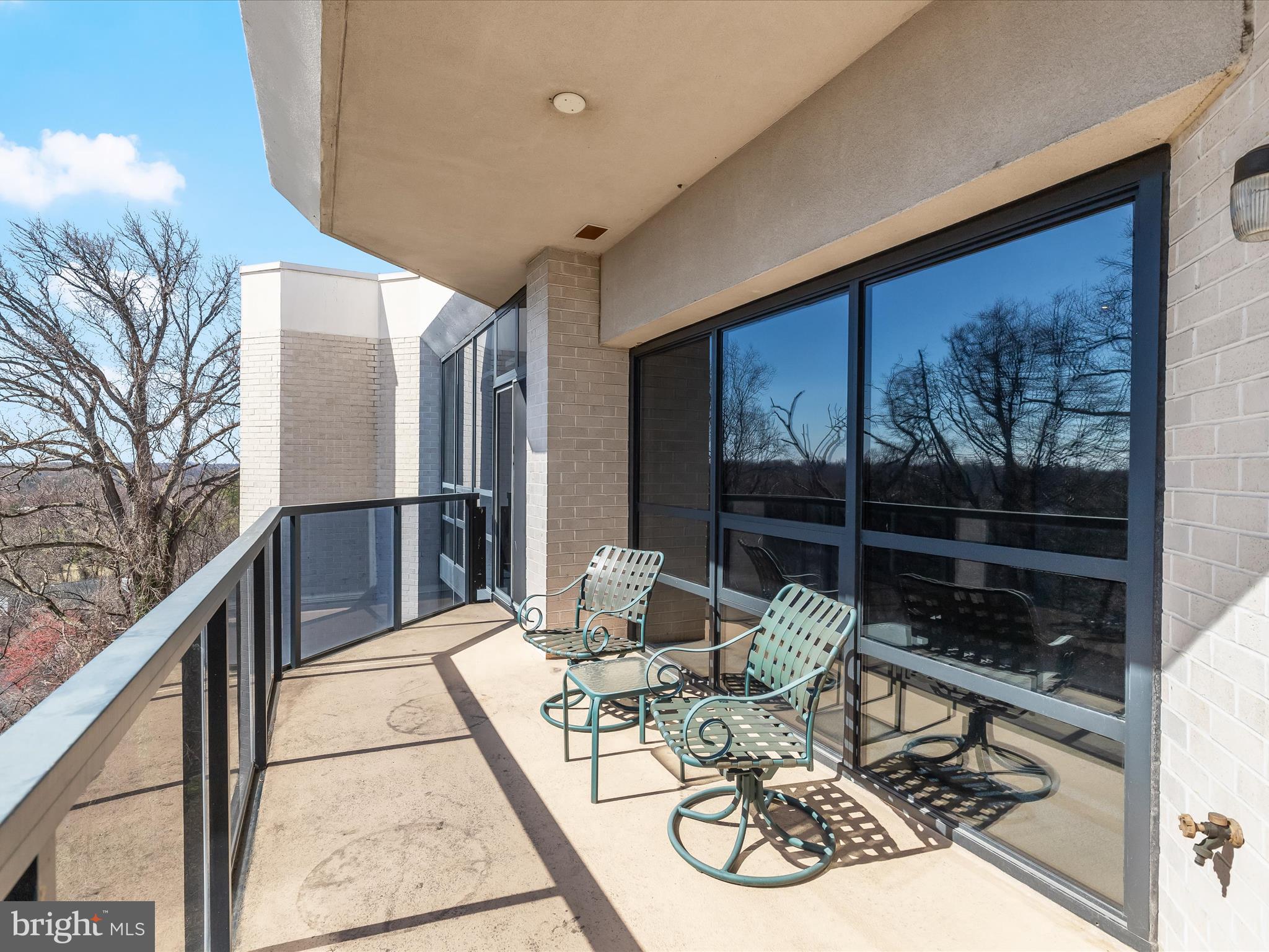 4001 Old Court Road, Unit 519 Pikesville, MD 21208 - Photo 10 of 43 a view of a chairs and tables in the balcony