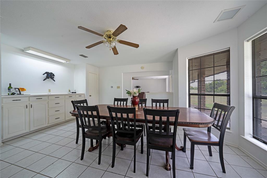 241 High Rdg Drive New Hope, TX 75071 - Photo 11 of 20 a view of a dining room with furniture and window