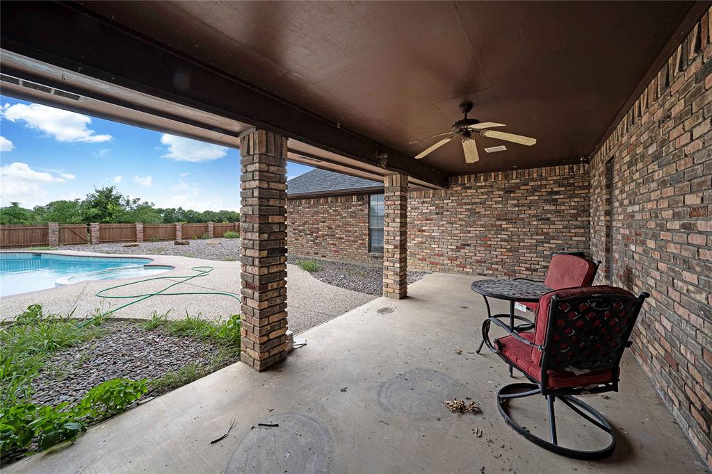 241 High Rdg Drive New Hope, TX 75071 - Photo 18 of 20 a patio with table and chairs