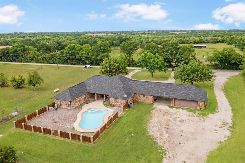 241 High Rdg Drive New Hope, TX 75071 - Photo 3 of 20 a aerial view of a house with a garden