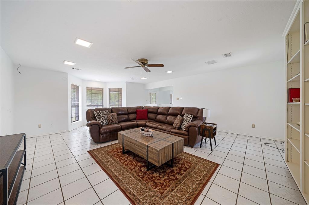 241 High Rdg Drive New Hope, TX 75071 - Photo 10 of 20 a living room with furniture and a rug