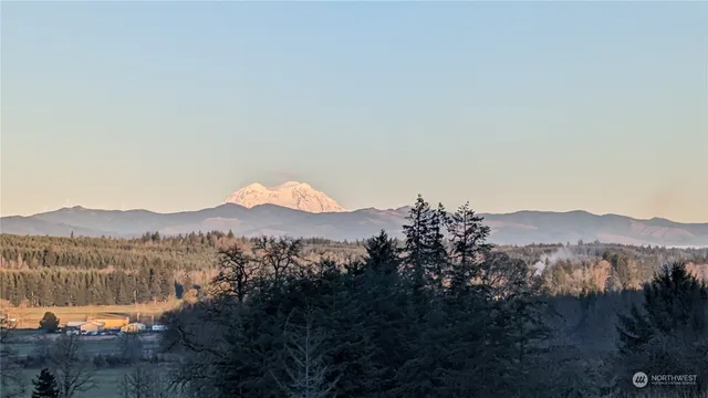 a view of lake with mountain