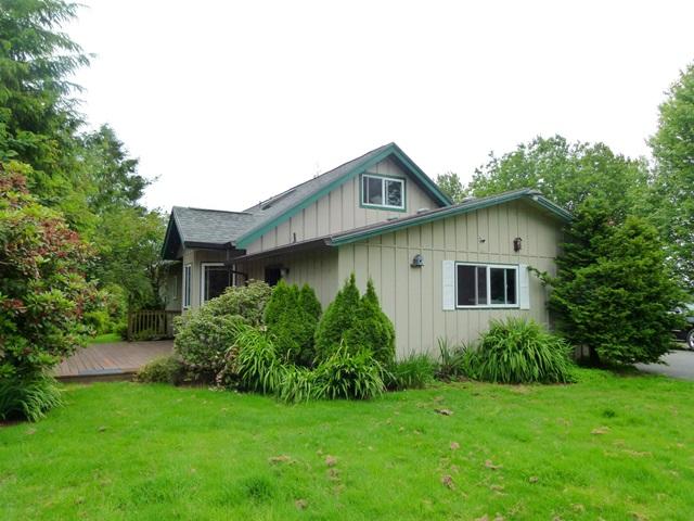 503 Hodgdon Road Tillamook, OR 97141 - Photo 7 of 43 a house view with a garden space