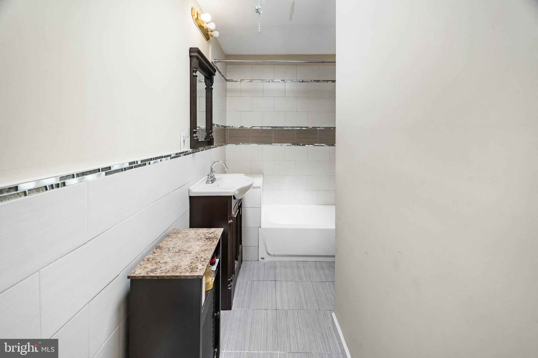 1837 73rd Avenue Philadelphia, PA 19126 - Photo 13 of 19 a utility room with dryer and washer