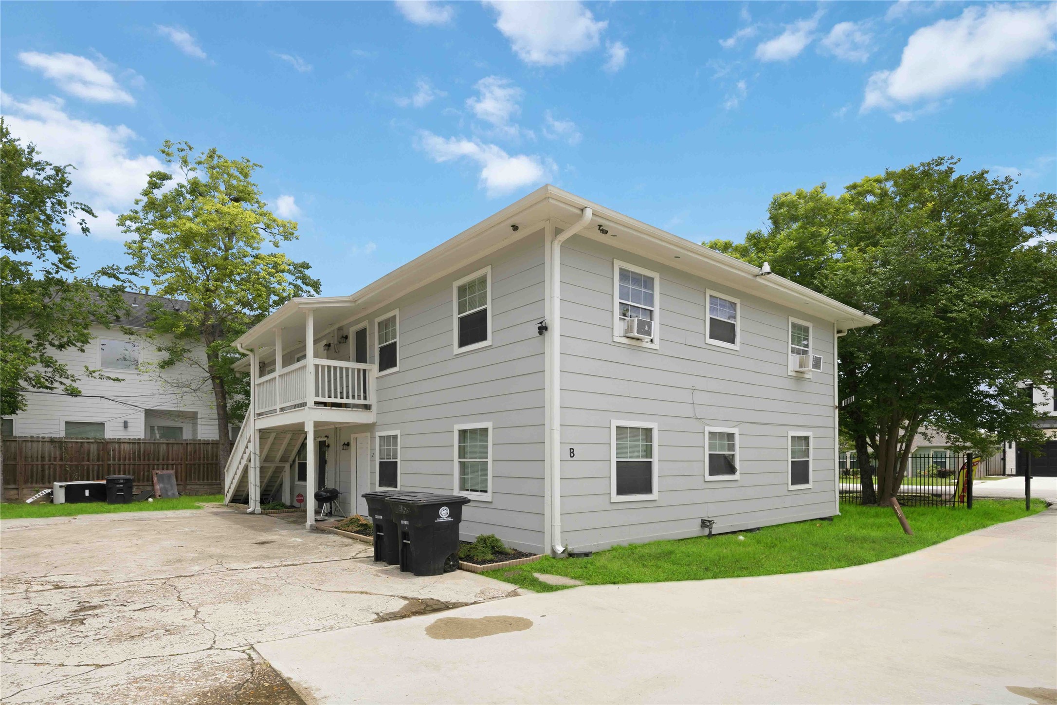 6726 Burkett Street Houston, TX 77021 - Photo 15 of 18 a view of a house with a yard