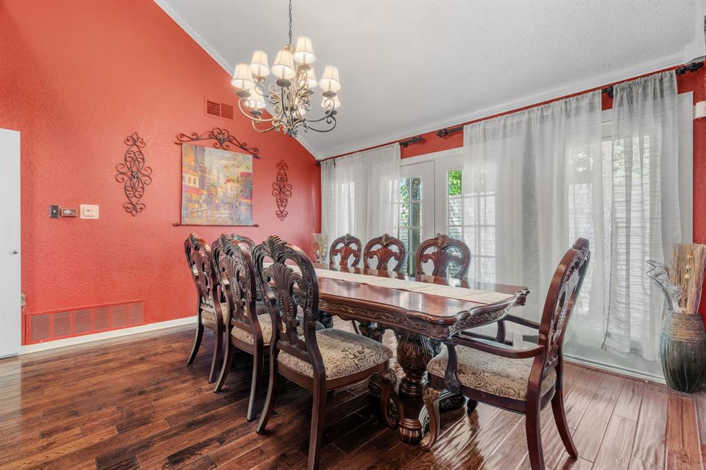 5107 Racquet Club Drive Arlington, TX 76017 - Photo 11 of 40 a view of a dining room with furniture window and wooden floor