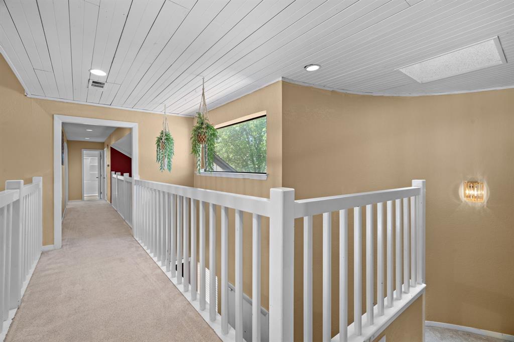 5107 Racquet Club Drive Arlington, TX 76017 - Photo 21 of 40 a view of a hallway with window