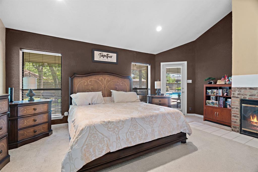 5107 Racquet Club Drive Arlington, TX 76017 - Photo 32 of 40 a bedroom with a bed and dresser