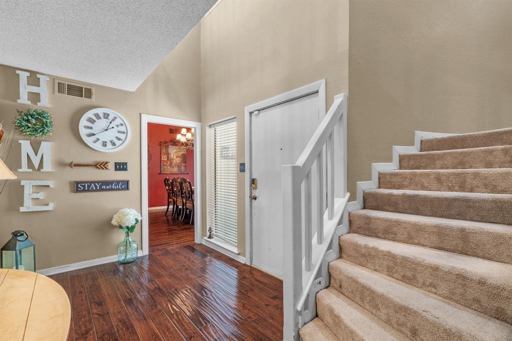 5107 Racquet Club Drive Arlington, TX 76017 - Photo 7 of 40 a view of an entryway with wooden floor