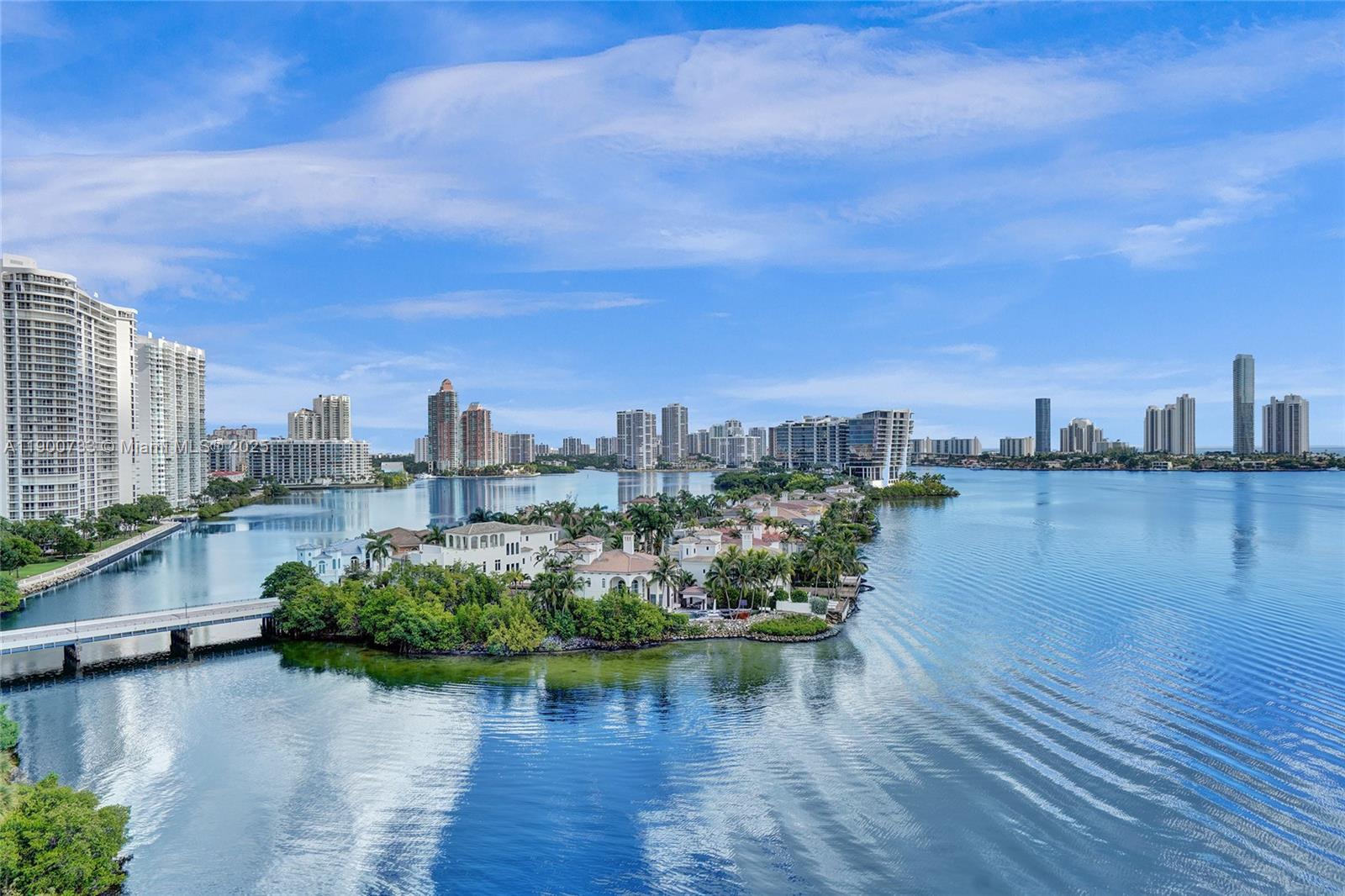 3000 Island Boulevard, Unit 1106 Aventura, FL 33160 - Photo 2 of 71 a view of a lake with a city