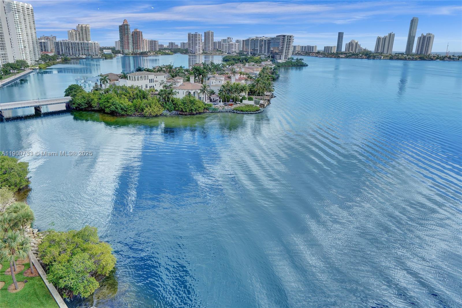 3000 Island Boulevard, Unit 1106 Aventura, FL 33160 - Photo 3 of 71 a view of a lake with a city