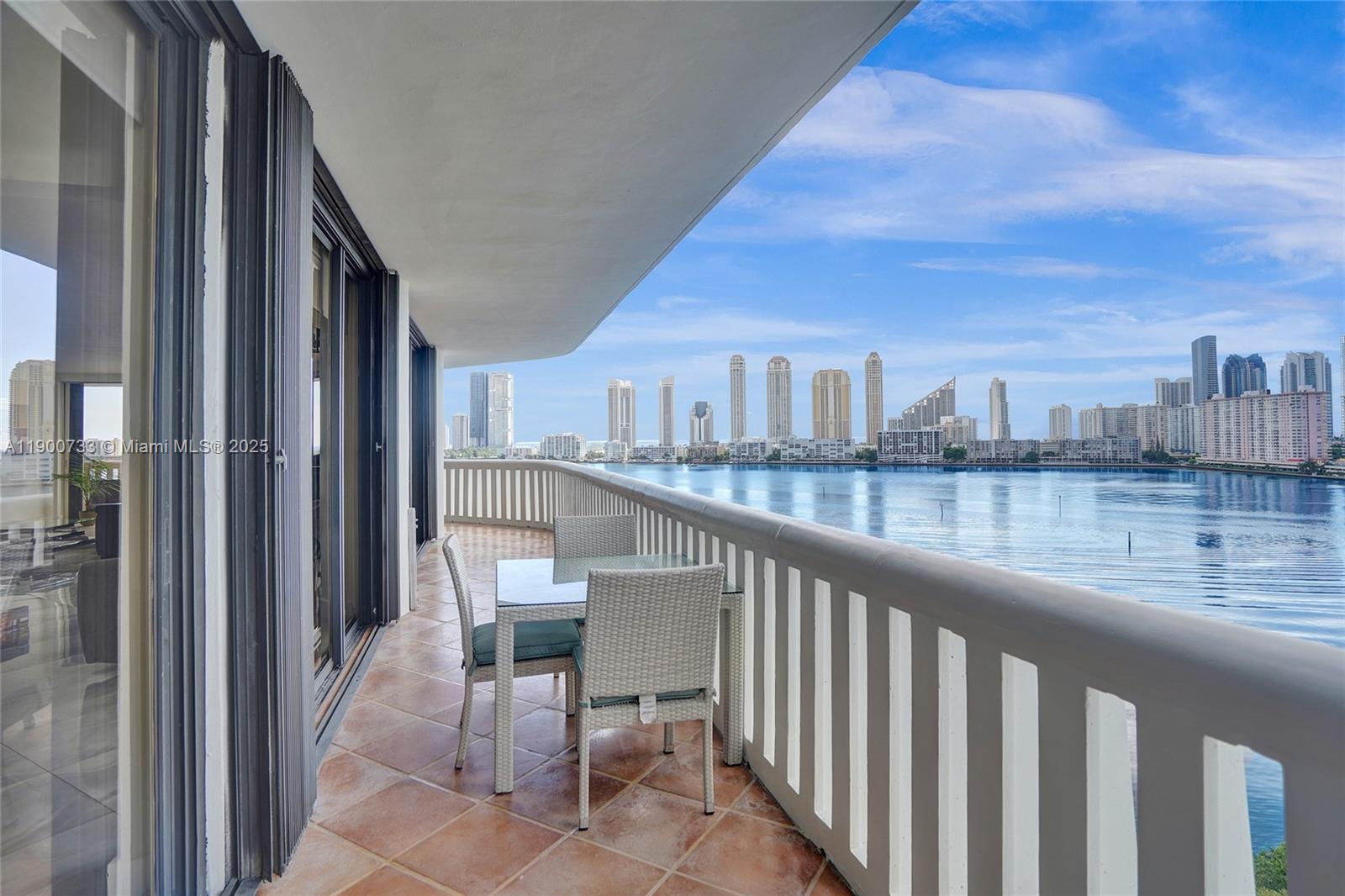 3000 Island Boulevard, Unit 1106 Aventura, FL 33160 - Photo 48 of 71 a view of balcony with outdoor seating and city view