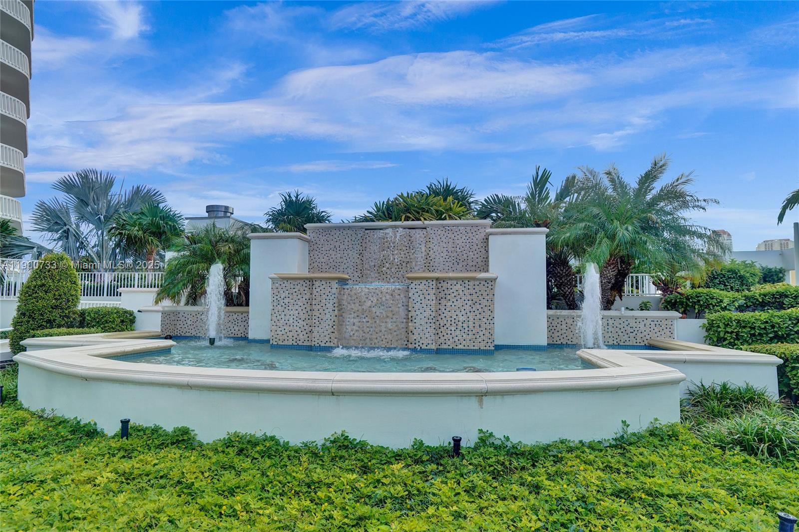 3000 Island Boulevard, Unit 1106 Aventura, FL 33160 - Photo 66 of 71 an aerial view of a house with a garden and yard