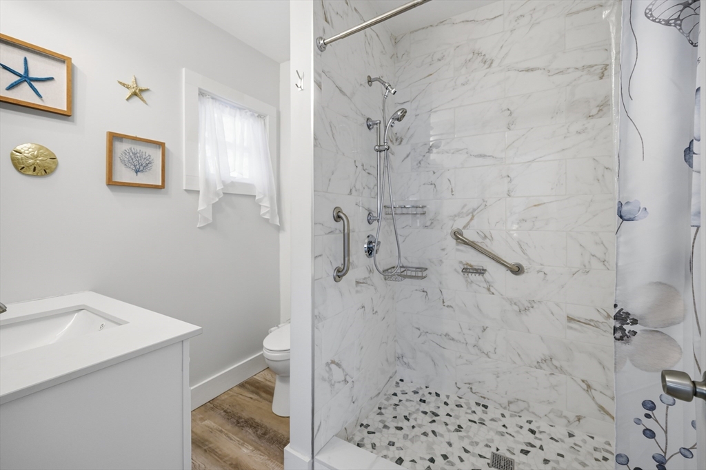 70 Wyman Street Lynn, MA 01905 - Photo 17 of 41 a bathroom with a shower and a sink