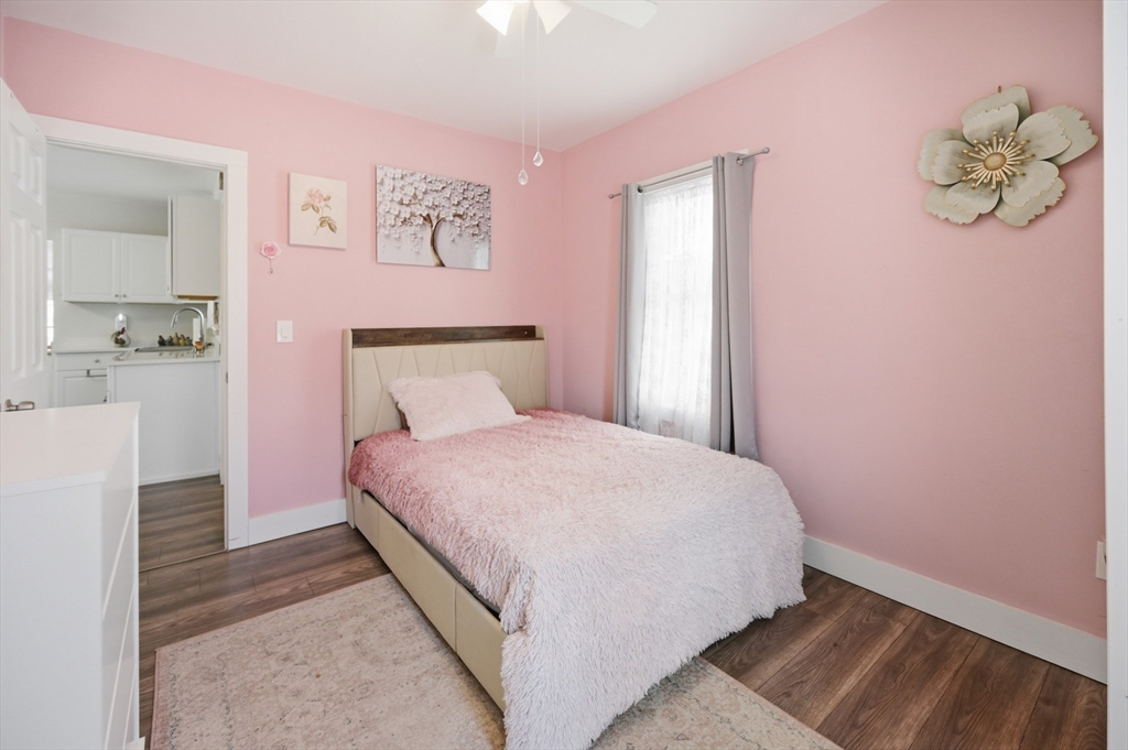 70 Wyman Street Lynn, MA 01905 - Photo 21 of 41 a bedroom with a bed and a window