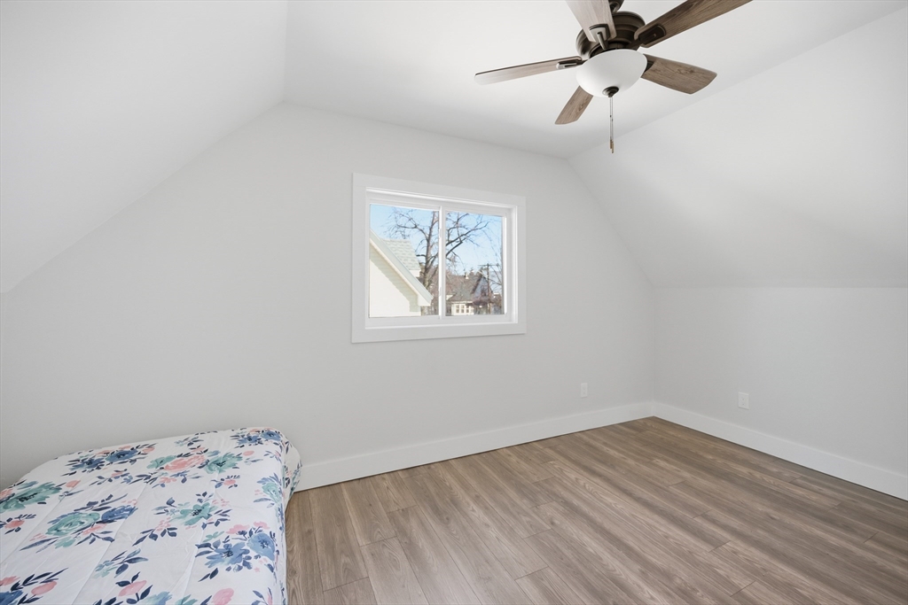 70 Wyman Street Lynn, MA 01905 - Photo 29 of 41 a view of a big room with wooden floor and closet