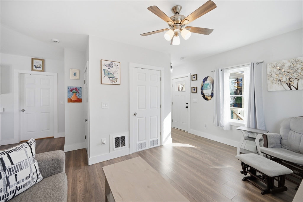 70 Wyman Street Lynn, MA 01905 - Photo 3 of 41 a living room with furniture and wooden floor