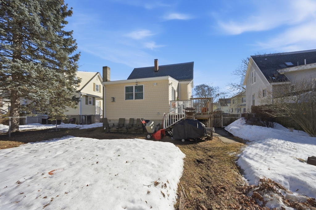 70 Wyman Street Lynn, MA 01905 - Photo 38 of 41 a view of a backyard with a stove