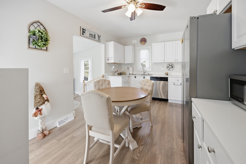70 Wyman Street Lynn, MA 01905 - Photo 8 of 41 a kitchen with kitchen island a white counter top space and stainless steel appliances