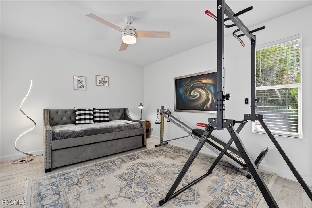 13570 Harbour Ridge Drive Fort Myers, FL 33908 - Photo 34 of 50 a living room with furniture and a flat screen tv