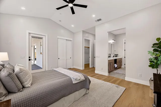 a white bath tub sitting next to a window