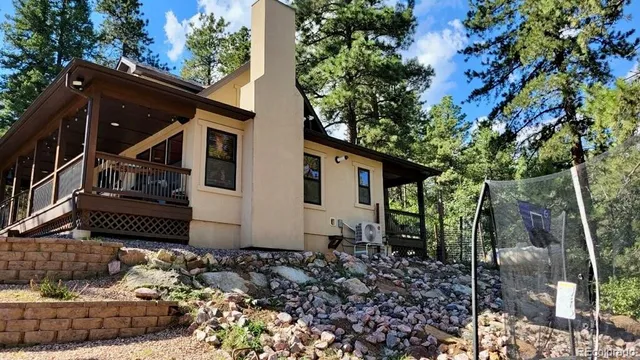 a bathroom with a sink mirror and toilet