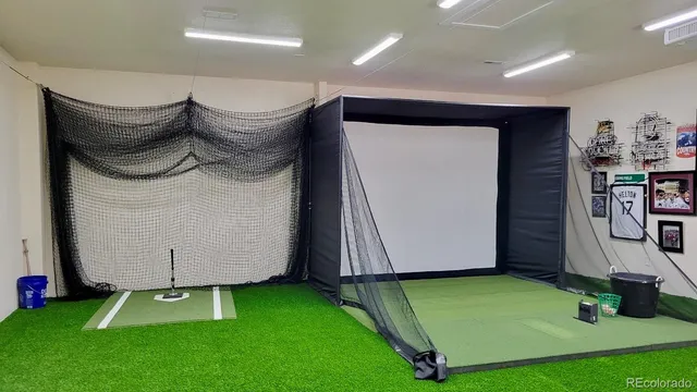 a living room with fireplace furniture and a window