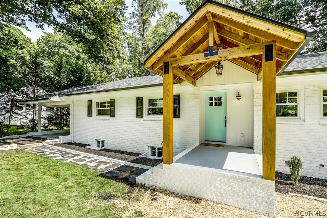 4549 Arrowhead Road Richmond, VA 23235 - Photo 1 of 16 a view of a house with a backyard