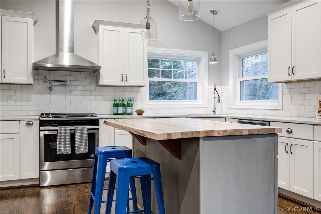 4549 Arrowhead Road Richmond, VA 23235 - Photo 6 of 16 a kitchen with stainless steel appliances a sink stove and cabinets
